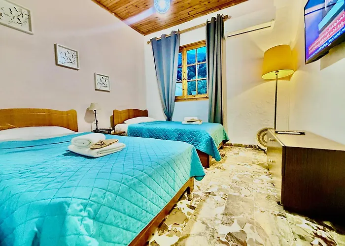 Travellers Gaddafi Agios Gordios بيت للعطل آغيوس غوذيوس